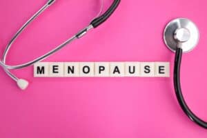 letters of the alphabet with the word Menopause. the concept of women's disease.